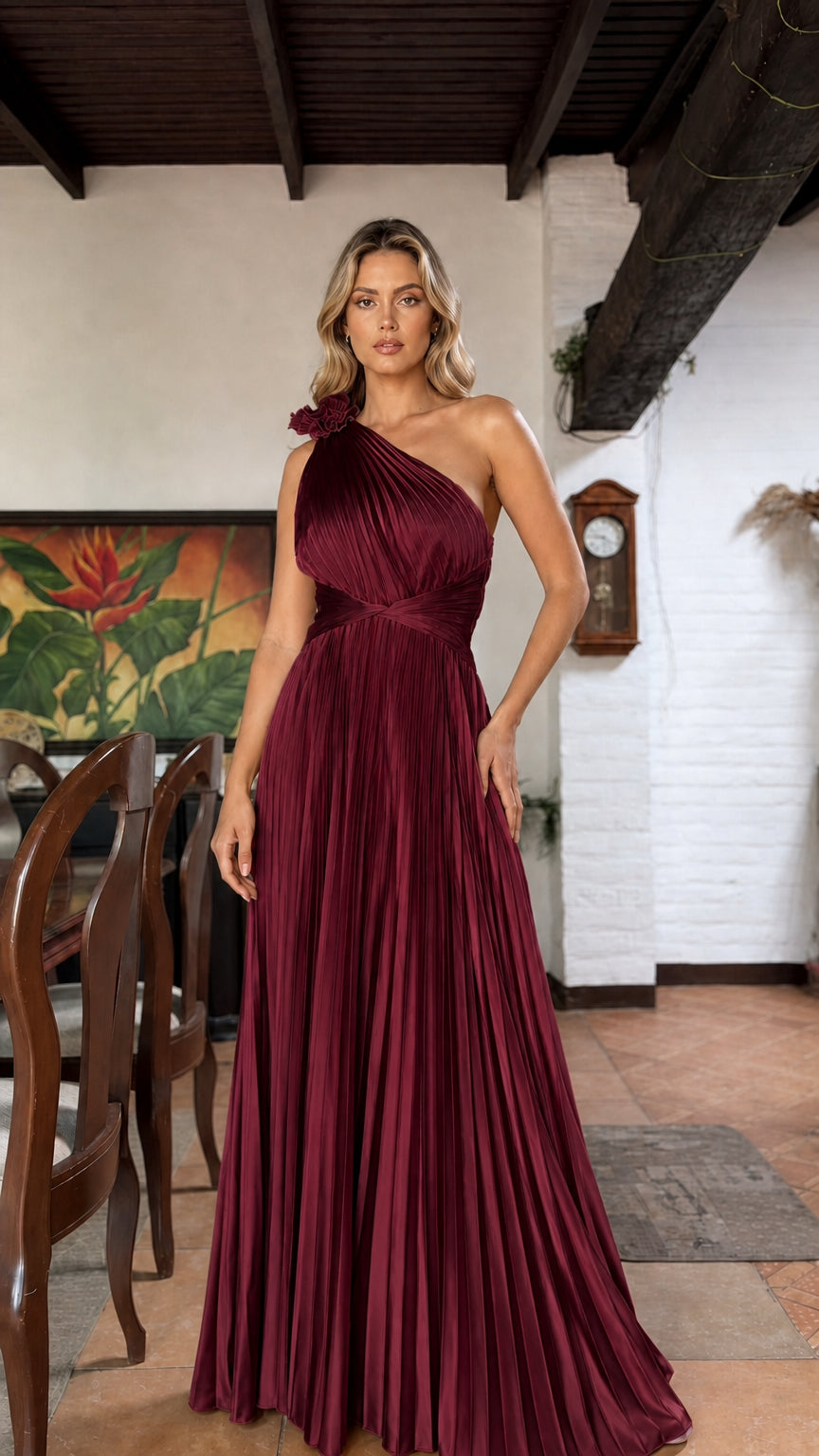 Front view of burgundy one-shoulder pleated maxi dress
