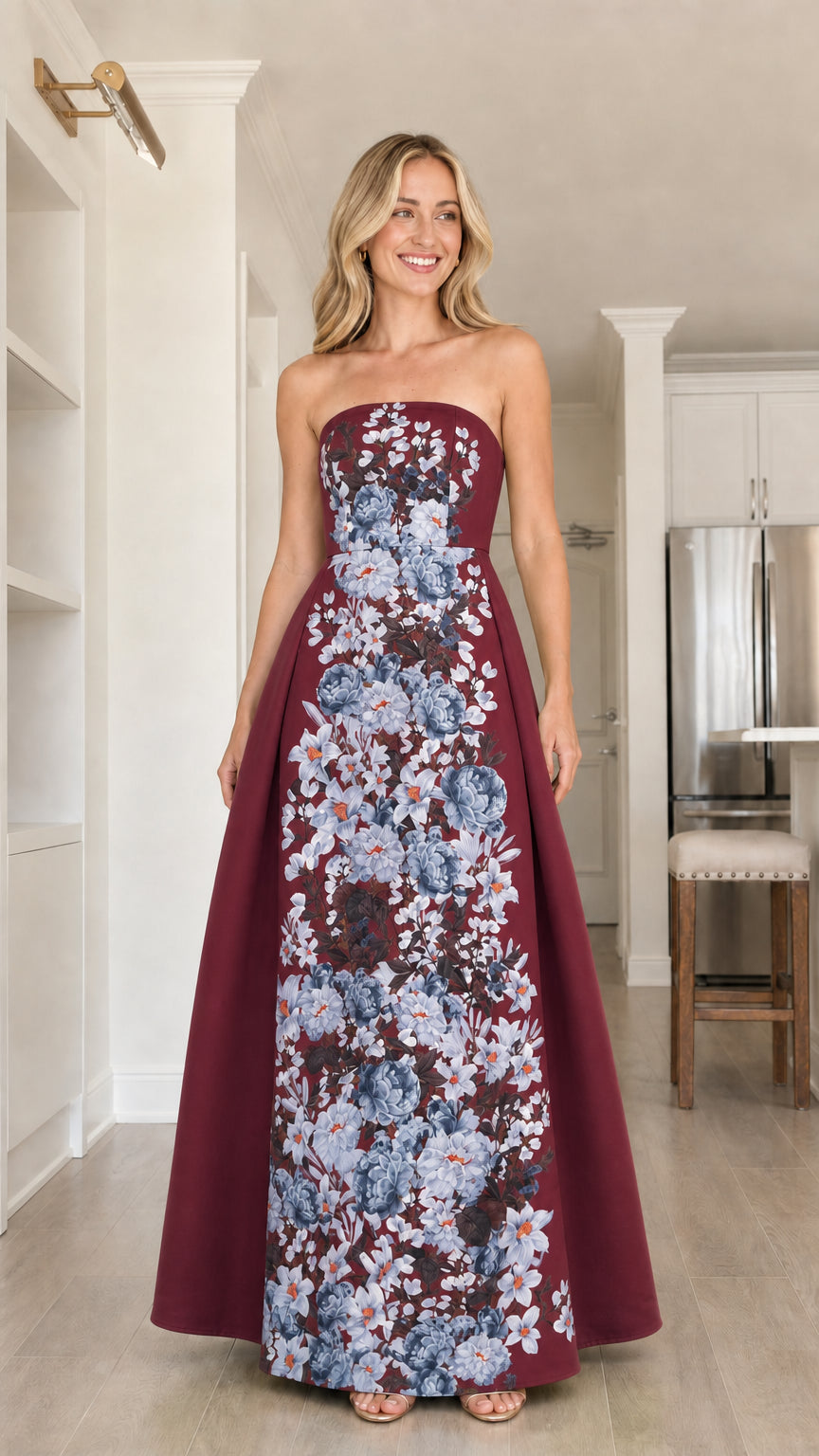 Front view of model in burgundy floral strapless maxi dress