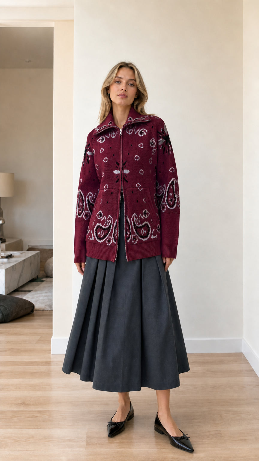 Burgundy red paisley jacquard zip-up knit cardigan on model