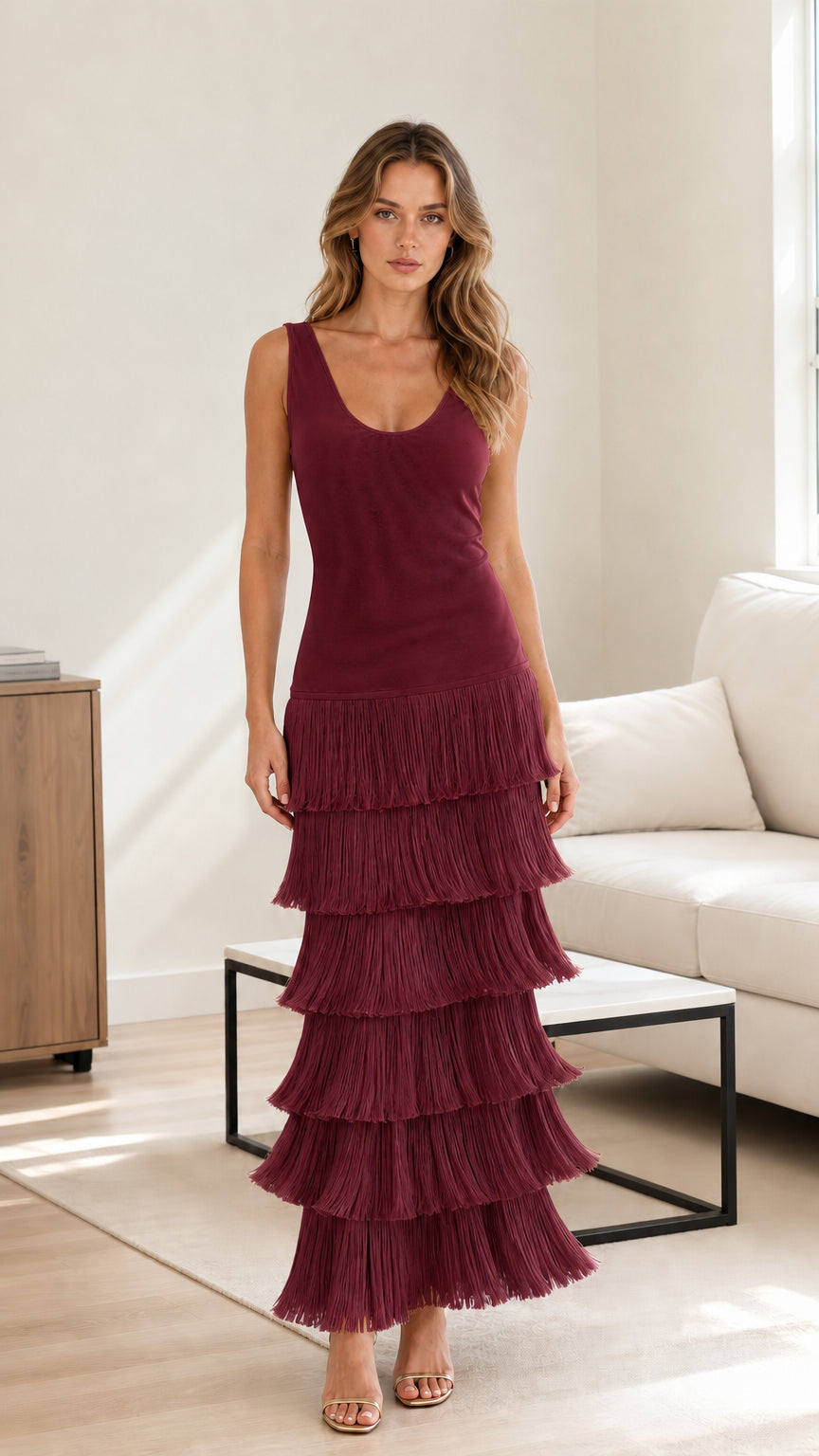Front view of model wearing burgundy red sleeveless tiered fringe maxi dress