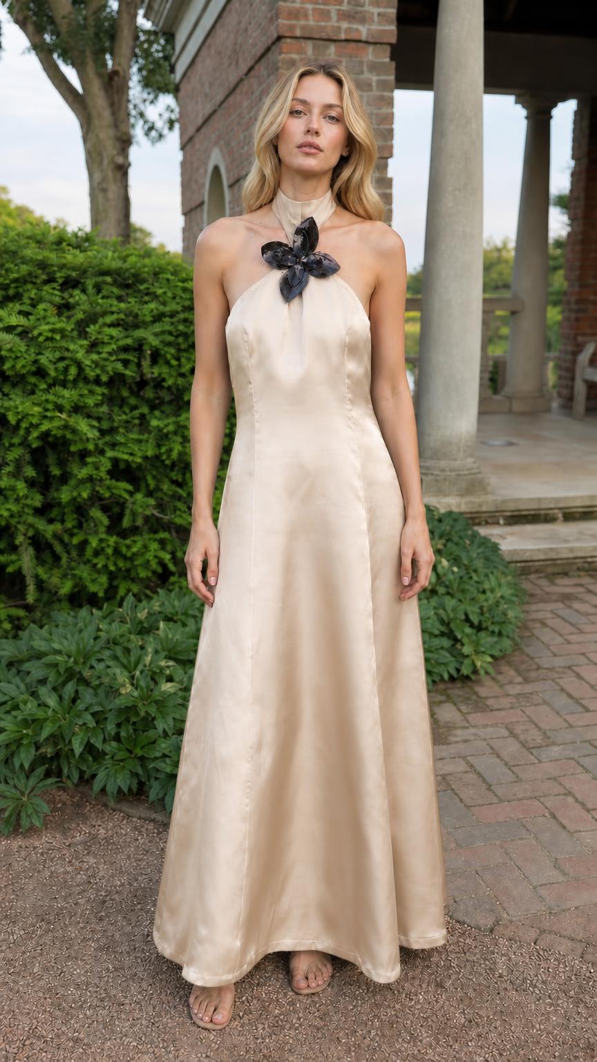 Full front view of model in champagne satin halter maxi dress