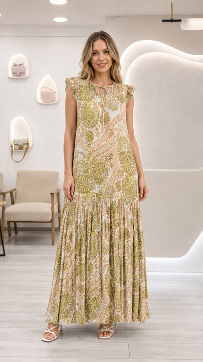 Full front view of model wearing beige cream paisley tiered maxi dress