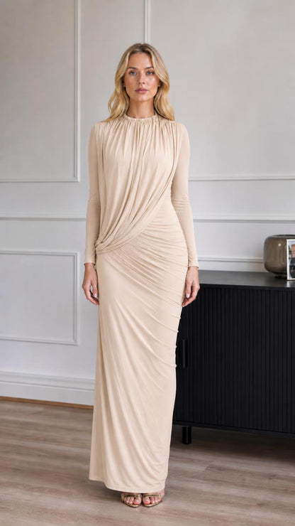 Model wearing champagne ruched long-sleeve maxi dress