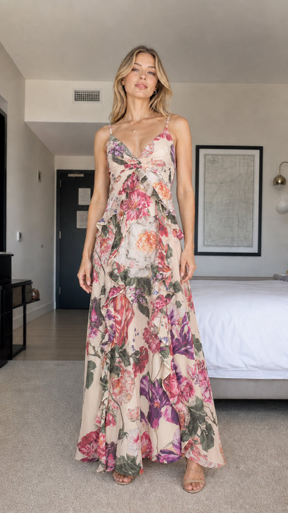 Model wearing cream floral print ruffle maxi dress