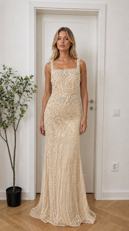 Model wearing champagne beaded evening dress