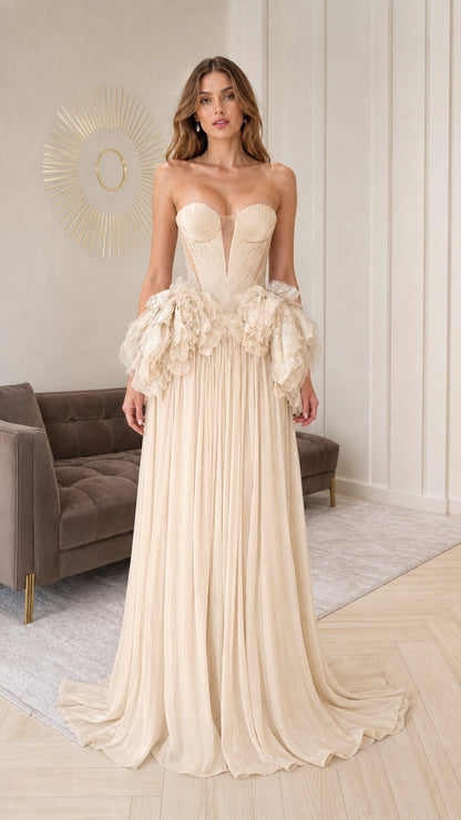 Champagne neutral strapless evening gown with textured waist