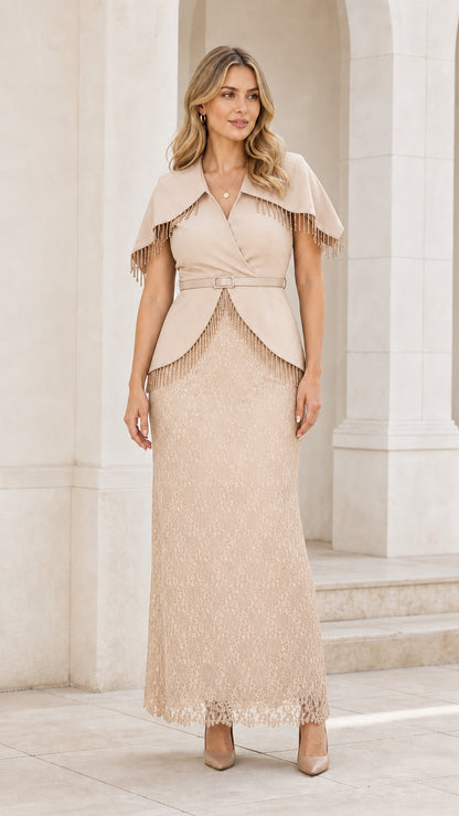 Front view of woman wearing beige cape overlay lace evening dress