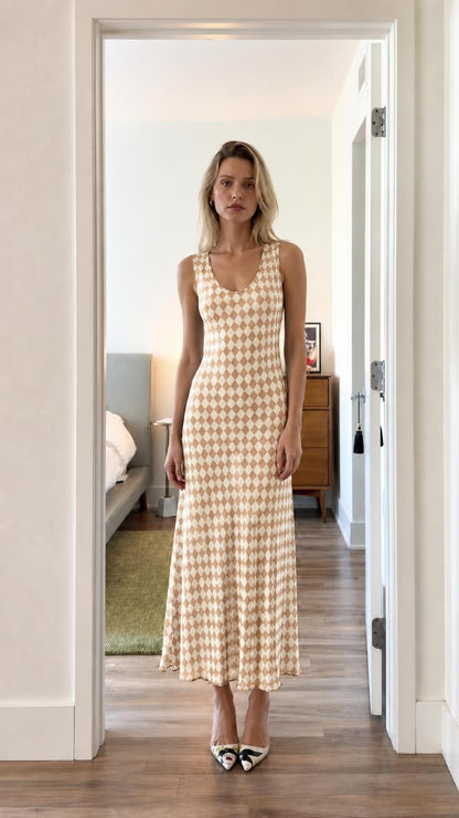 Front view of model wearing beige argyle dress
