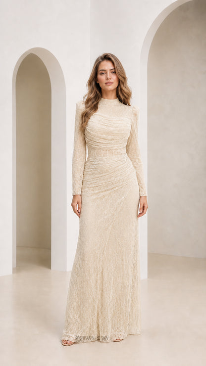 Model wearing champagne lace maxi dress