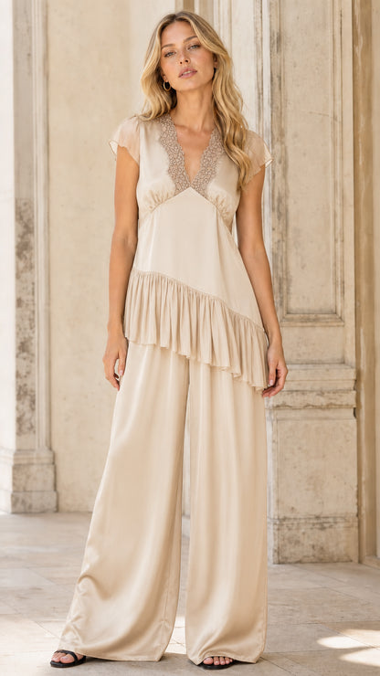Champagne color variant of the satin ruffle tunic and wide leg pants