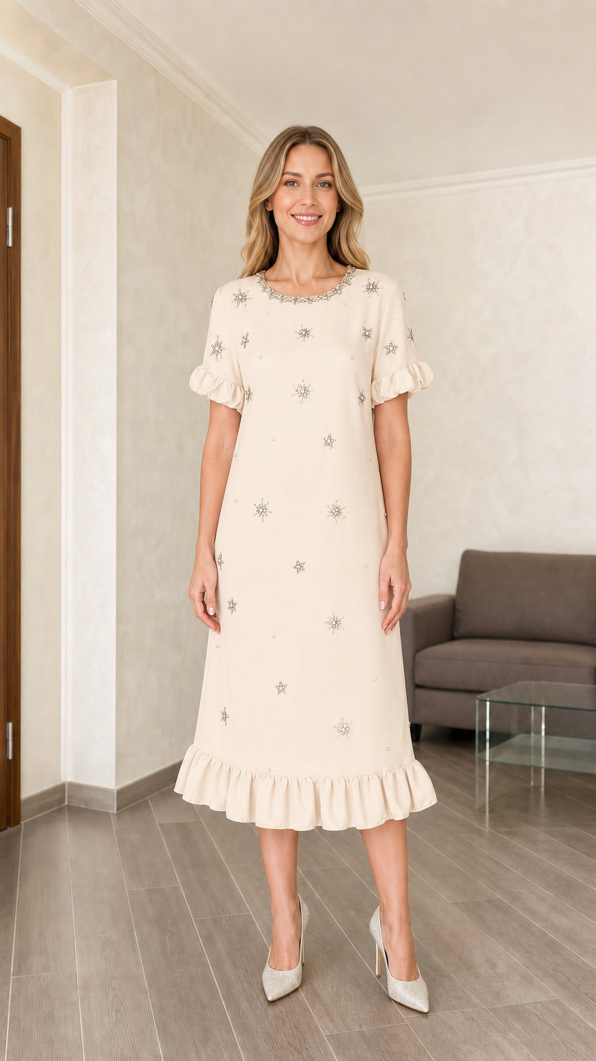 Model wearing off-white embellished midi dress