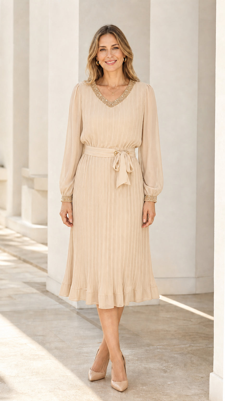 Front view of champagne long sleeve pleated midi dress