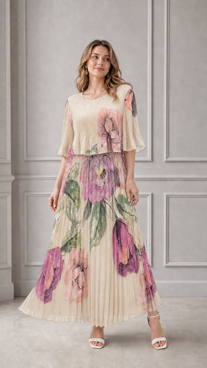 Model wearing cream beige floral pleated maxi dress with flutter sleeves