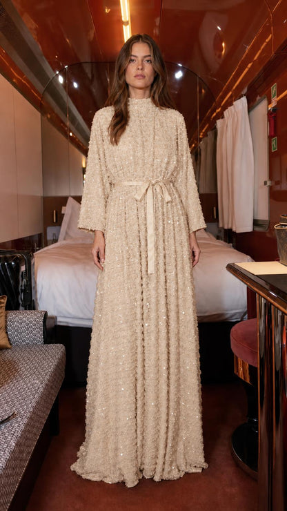 Front view of champagne textured sequin maxi dress