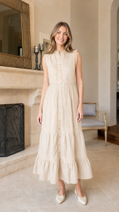 Front view of beige sleeveless tiered midi dress