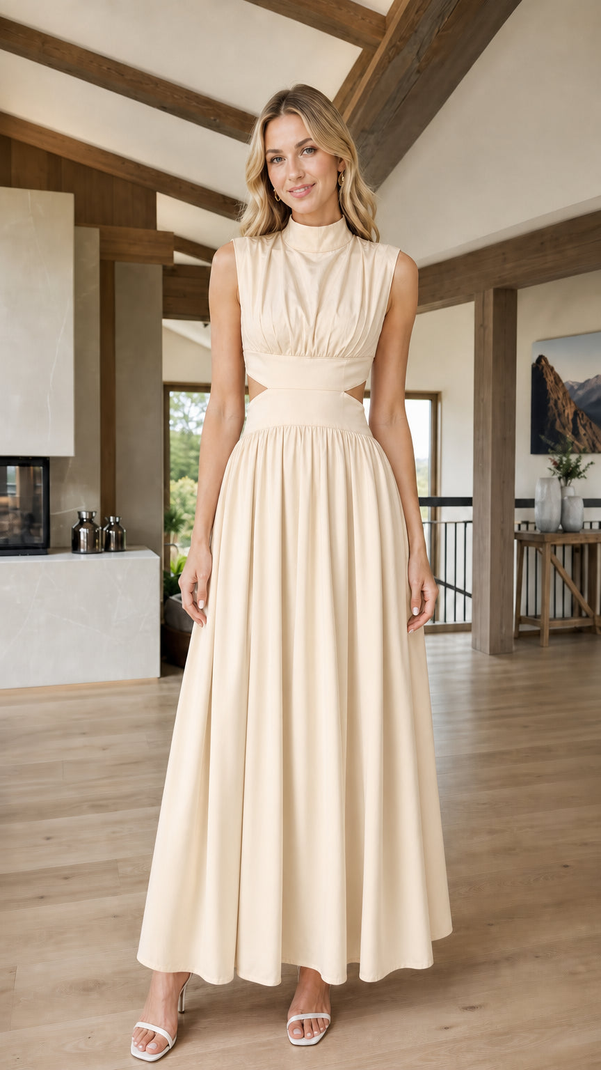 Front view of woman wearing beige cutout maxi dress