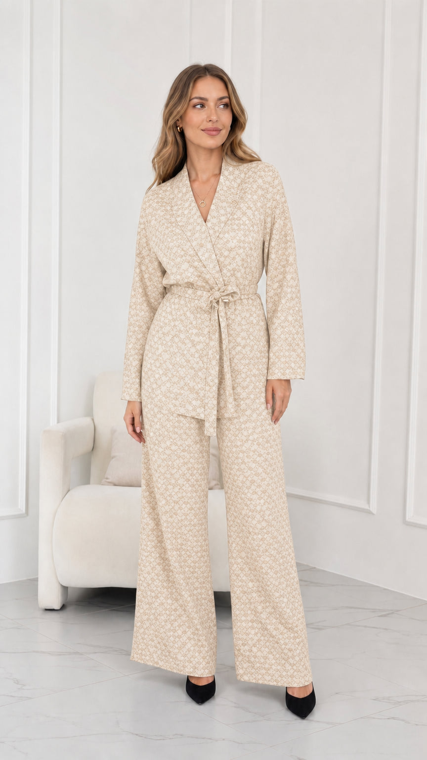Model wearing beige cream geometric print belted pant suit set