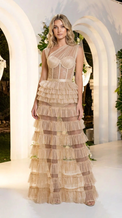 Front view of champagne nude one-shoulder corset tiered tulle maxi dress