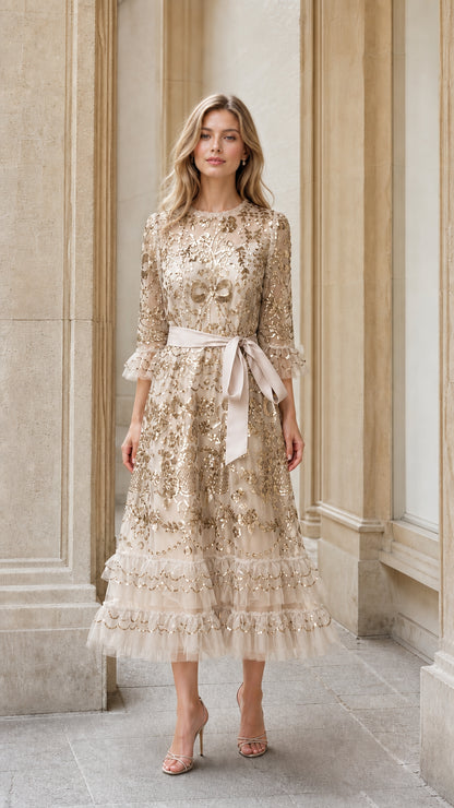 Front view of champagne sequin embroidered tulle midi dress