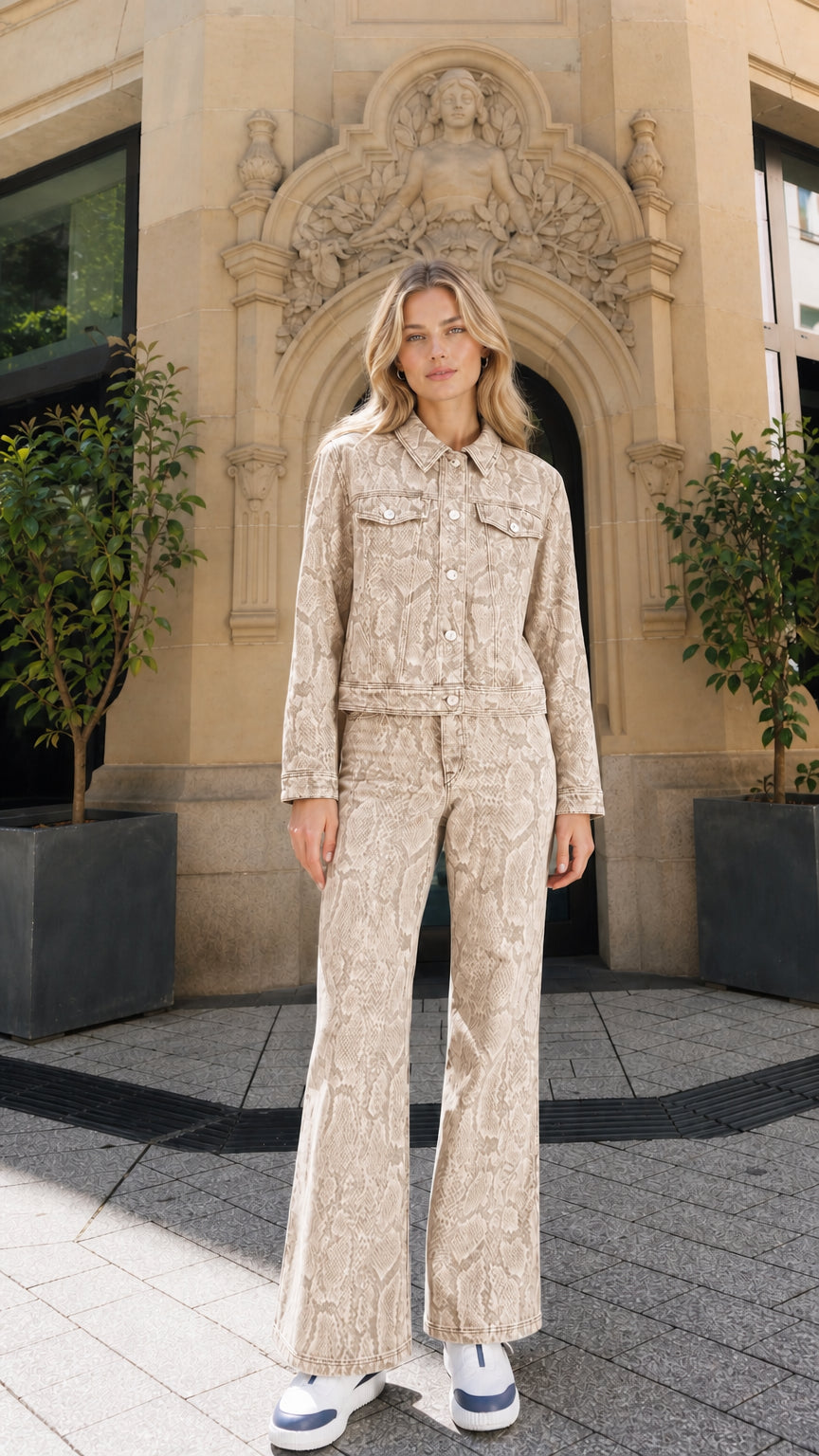 Full view of model wearing khaki snake print denim matching set