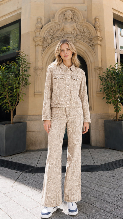 Full view of model wearing khaki snake print denim matching set