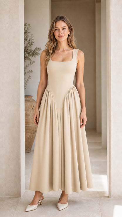 Front full view of woman wearing beige maxi dress