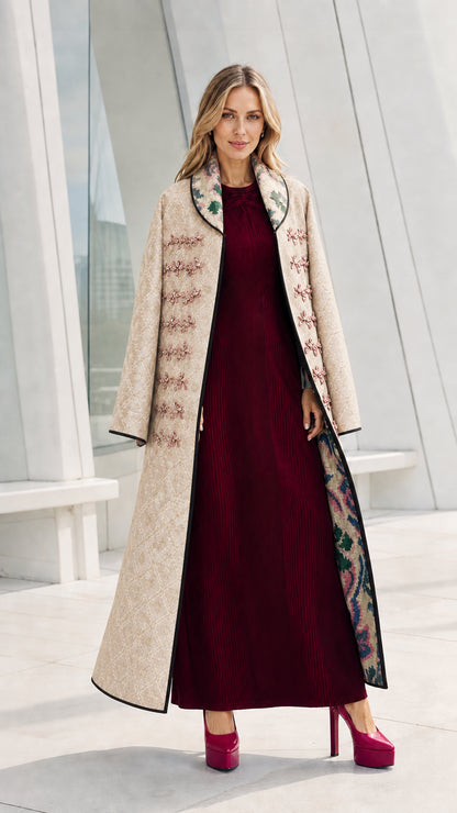 Model wearing the beige variant of the quilted long coat
