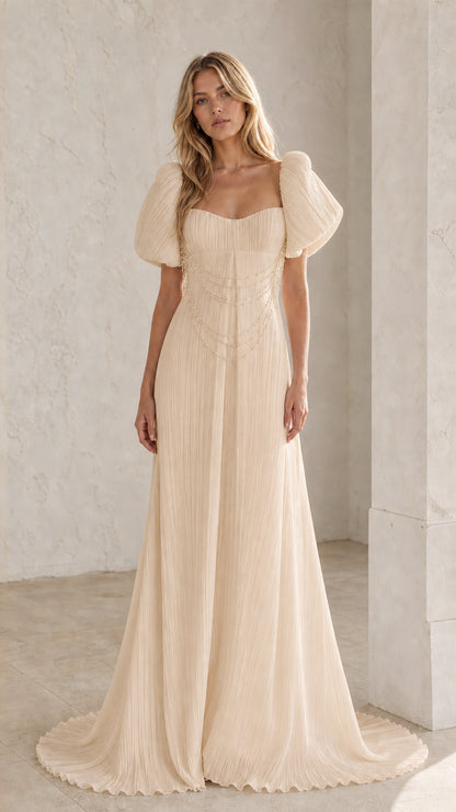 Front view of Champagne pearl draped pleated maxi dress