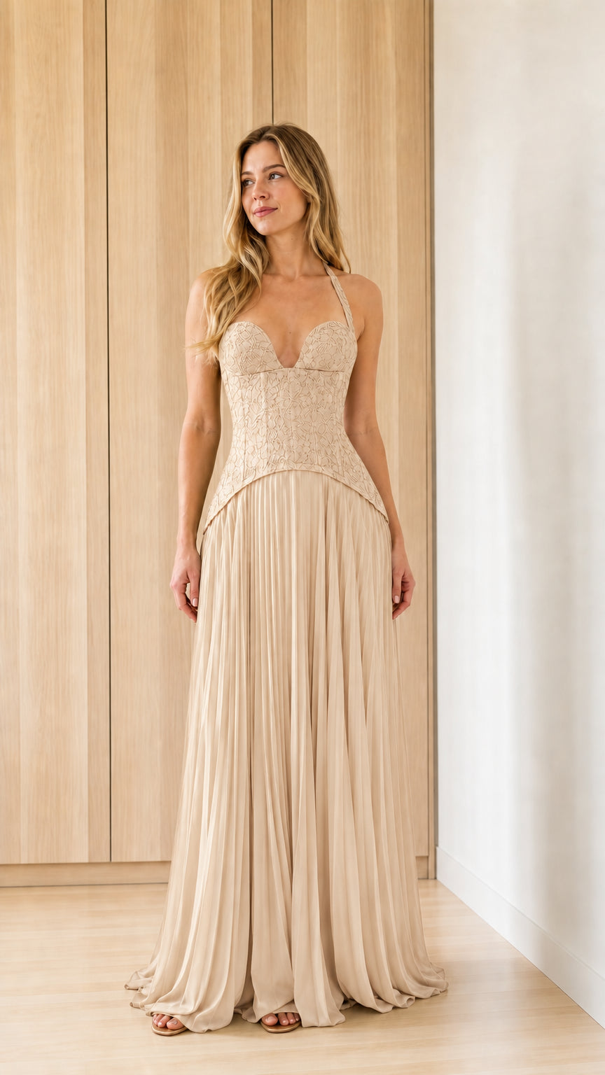 Front view of champagne halter lace bodice pleated maxi dress