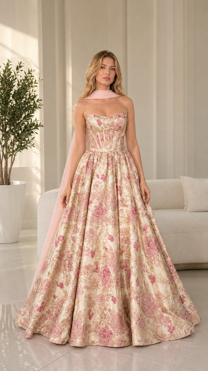 Model wearing champagne gold floral brocade ball gown