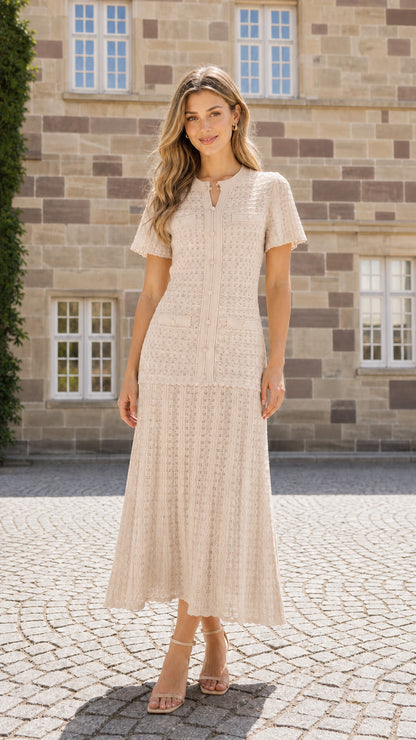 Front view of model wearing beige textured knit midi dress