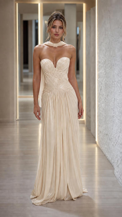 Front view of champagne beige pleated strapless evening dress