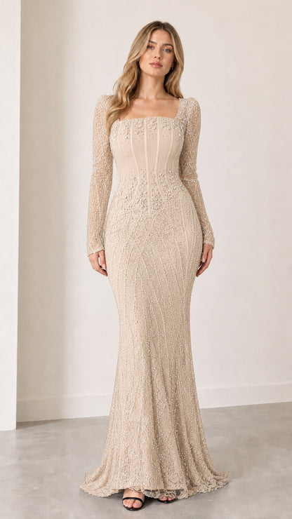 Full front view of champagne nude beaded corset long sleeve evening dress