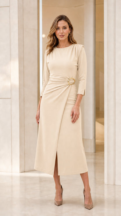 Model wearing cream off-white 3/4 sleeve gathered waist midi dress with gold buckle