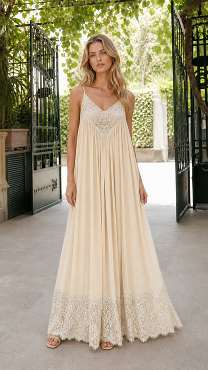 Front view of woman wearing champagne cream monochromatic lace trim pleated maxi dress