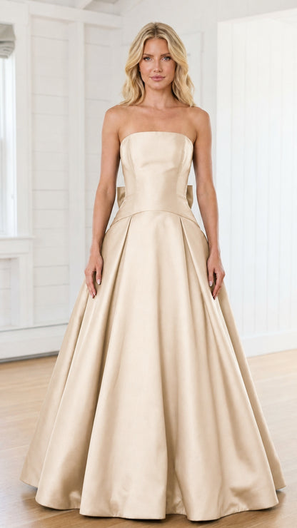 Front view of model in champagne evening gown