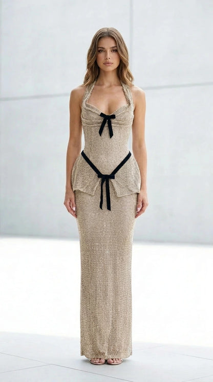 Front view of gold glitter halter maxi dress