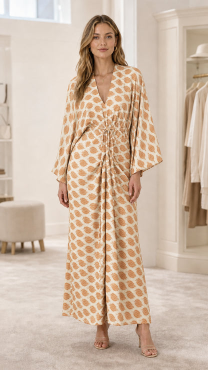 Model wearing beige geometric print maxi dress