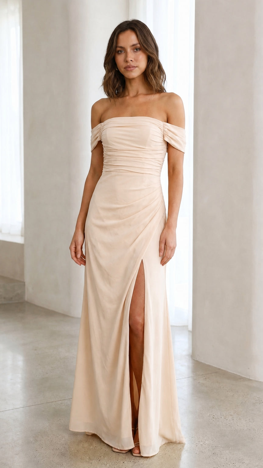 Front view of champagne off-the-shoulder ruched maxi dress