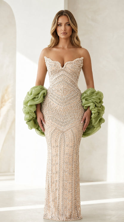 Front view of champagne beaded evening gown