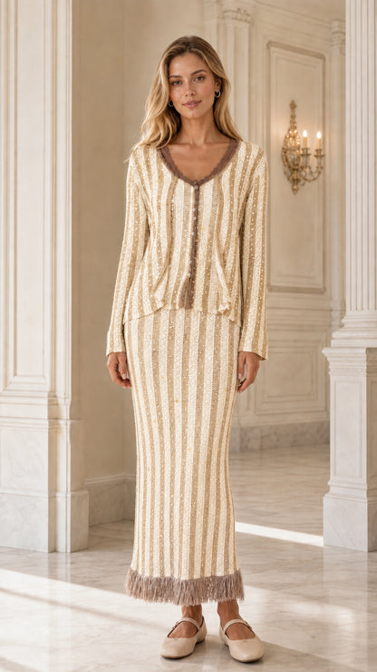 Full front view of model wearing champagne cream striped sequin knit cardigan set