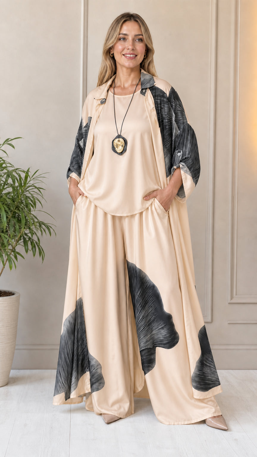 Woman wearing champagne abstract print 3-piece set