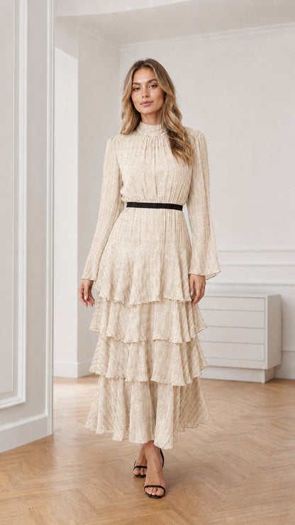 Model wearing cream long sleeve tiered mock neck maxi dress