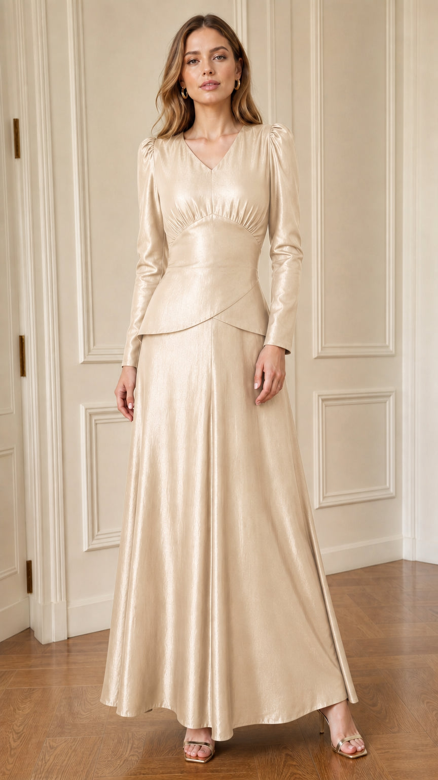 Woman posing in champagne faux leather long sleeve maxi dress