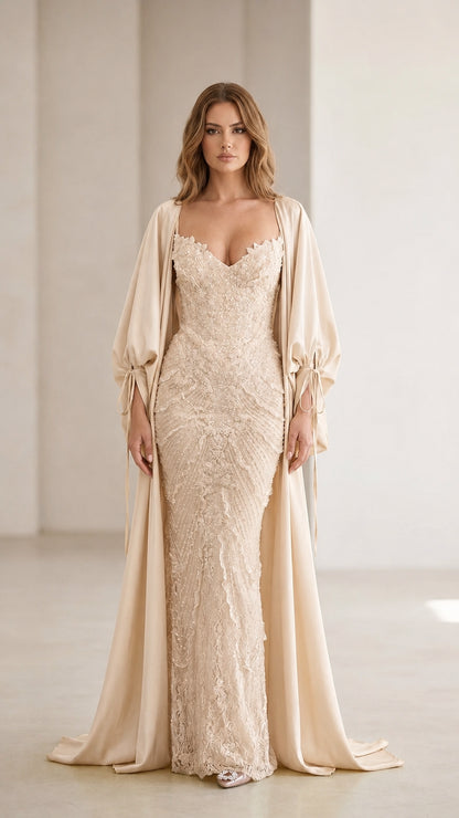 Front view of champagne color variant of the evening gown and cape