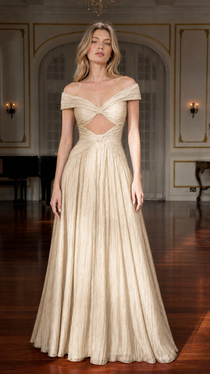 Front view of model wearing champagne colored formal gown