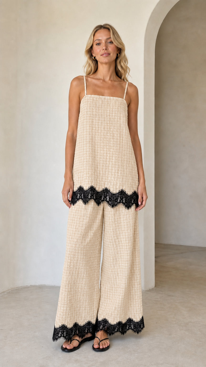 Model wearing beige plaid two-piece set with black lace hem