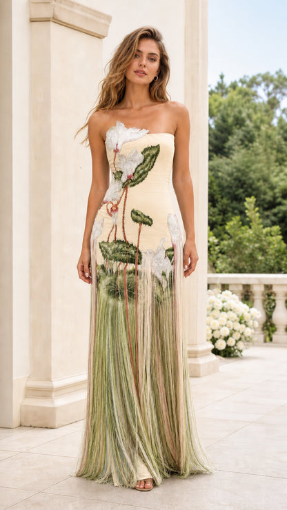 Front view of model wearing Cream strapless floral embroidered fringe maxi dress