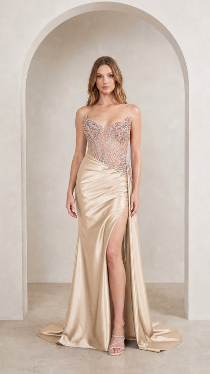Model wearing champagne evening gown front view