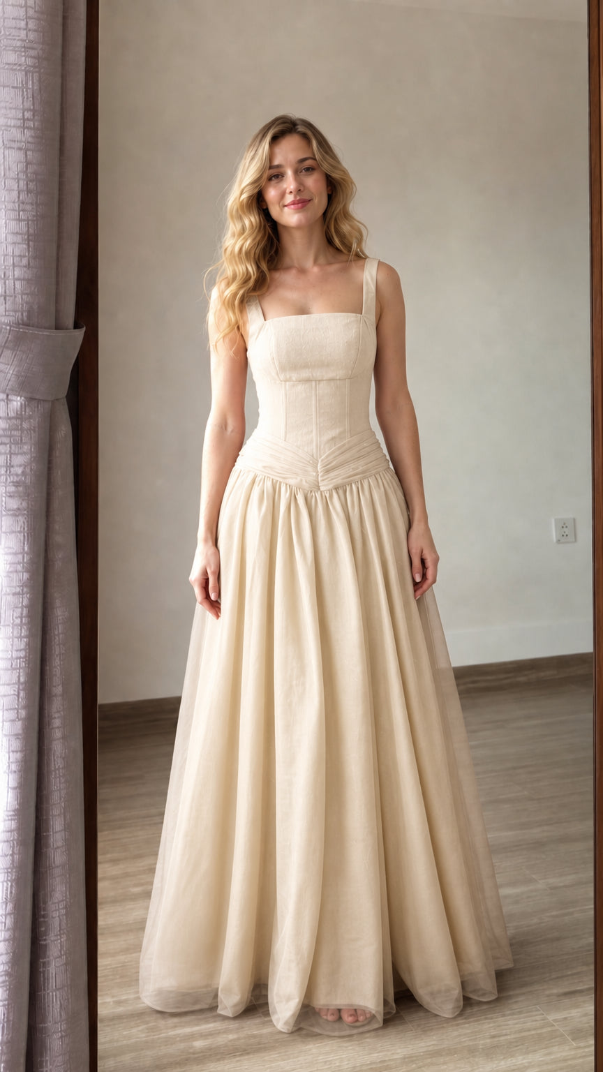 Front view of champagne beige corset-style long tulle evening gown